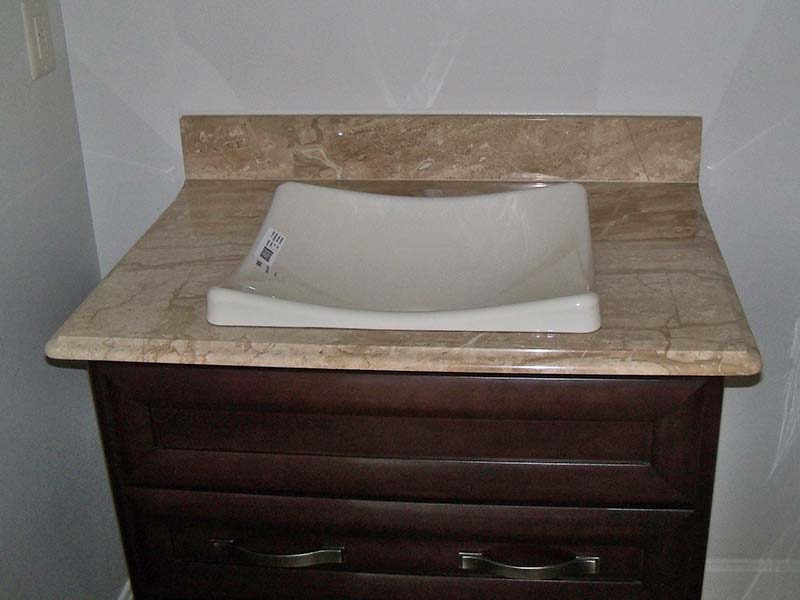 Daino Realle Marble bathroom counter with vessel sink