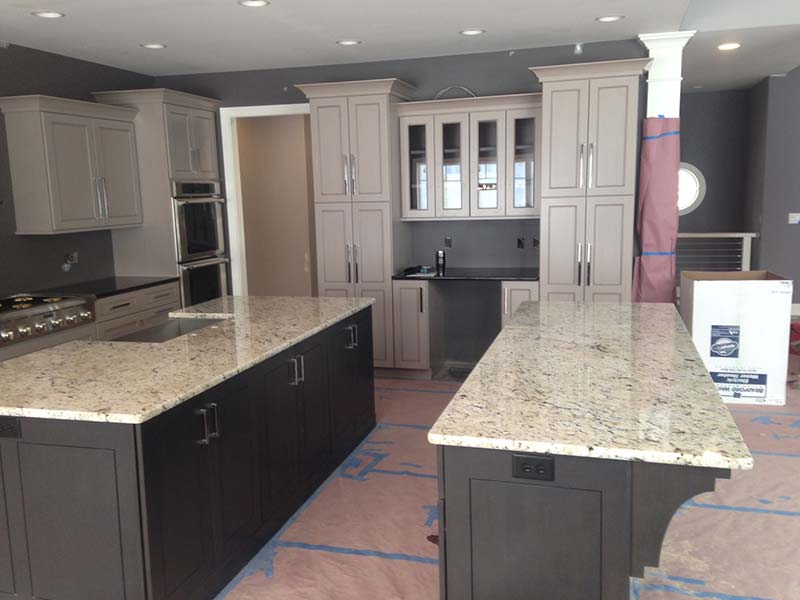 Polished Delicatus Granite on Expresso or Painted cabinets look great.
