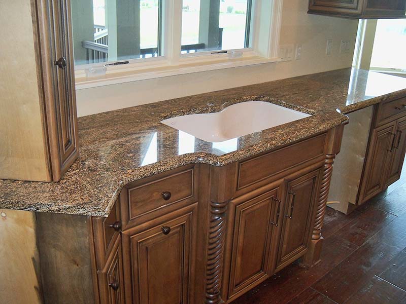 Stormy Night Granite with the custom double sink over ashen retro looking cabinets.
